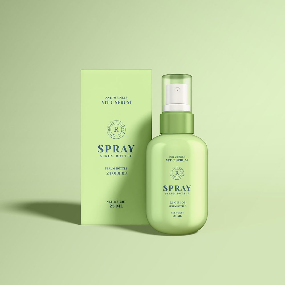 A bottle of spray on top of a green surface.